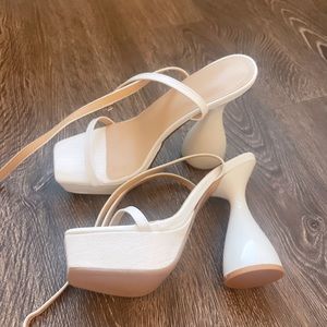 White snakeskin platform heels